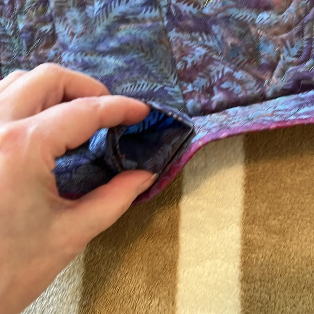 Homemade quilted wall hanging.